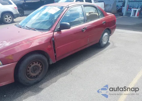 2000 Mitsubishi Mirage De z USA, uszkodzony, nr VIN JA3AY26CXYU030328